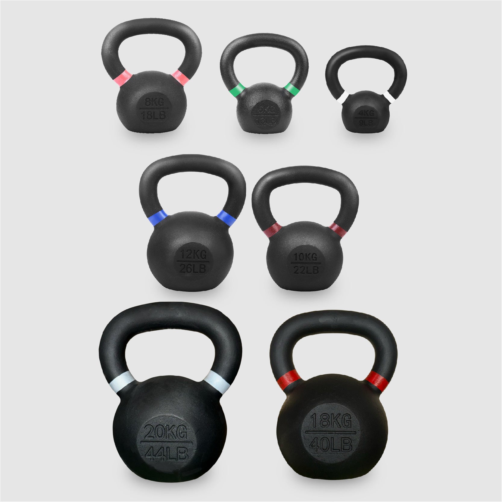 Set of black kettlebells with different weights on a white background